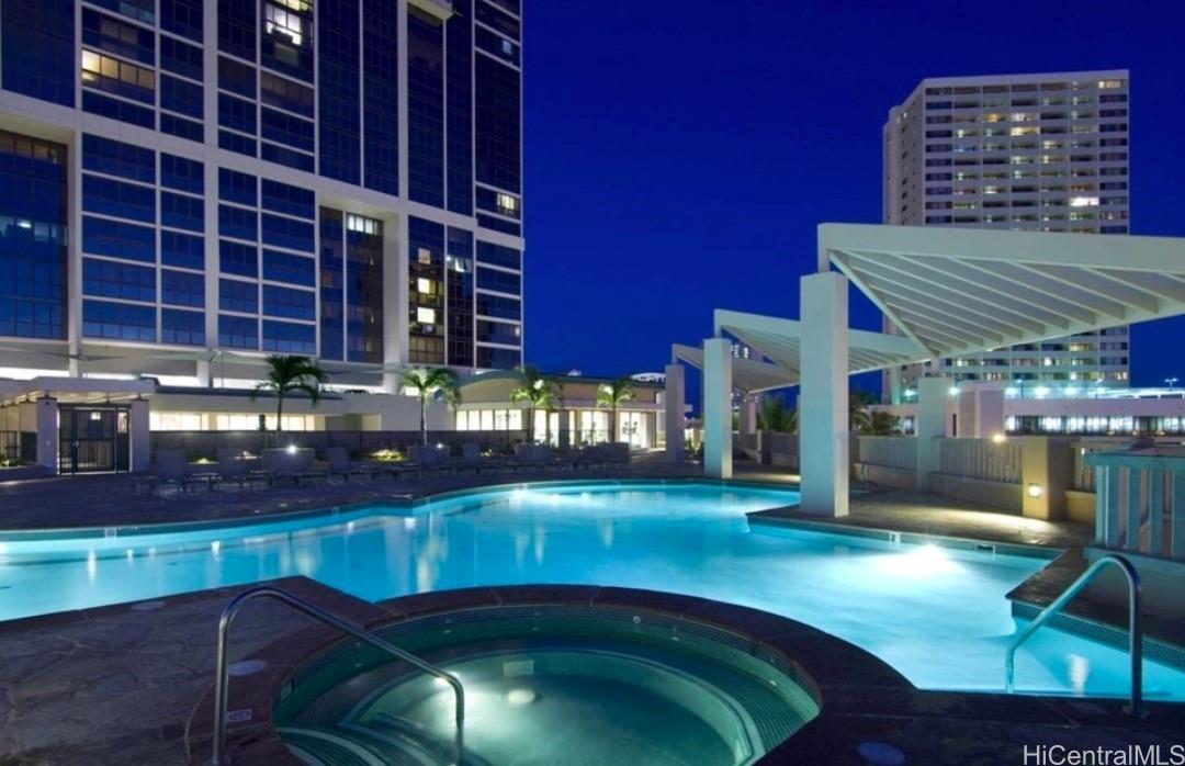 600 Queen Street, Unit 3203 Honolulu, HI 96813 - Photo 8 of 8 a view of a swimming pool with outdoor seating
