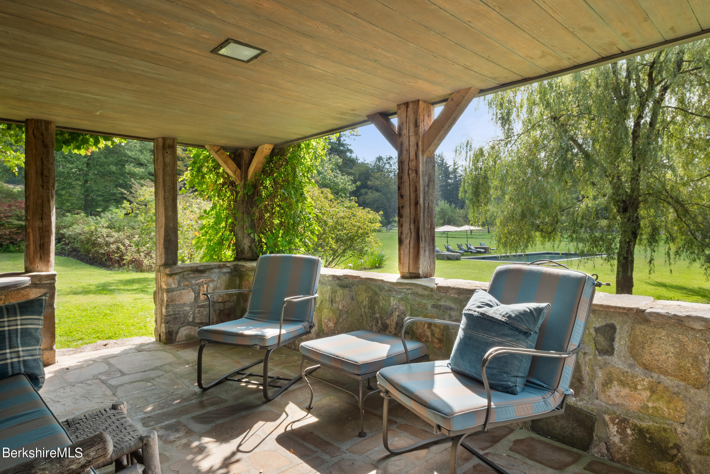 Undisclosed Address Monterey, MA 01245 - Photo 34 of 46 GUEST HOUSE PORCH AND POOL