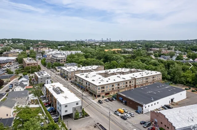 an aerial view of a multi story parking space