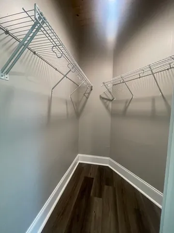 a view of a room with racks on the wall