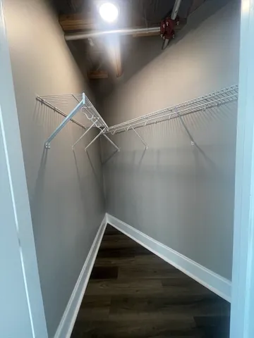 a view of an empty walk in closet