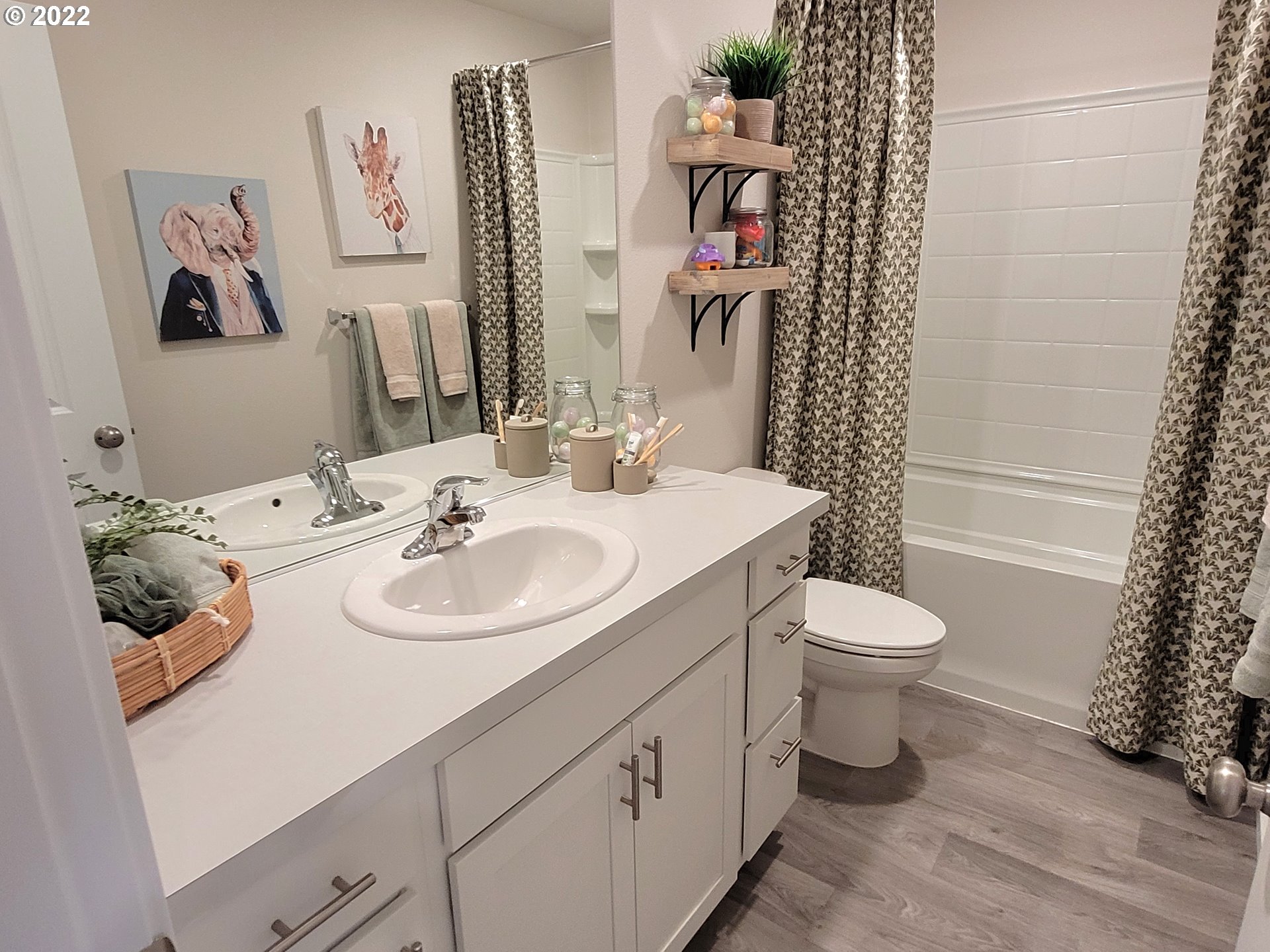 2660 26th Loop Springfield, OR 97477 - Photo 12 of 17 a bathroom with a sink toilet and shower