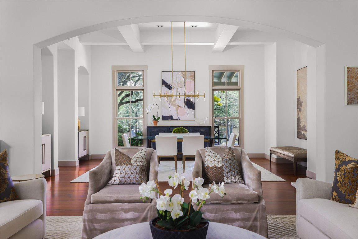 3020 Maravillas Loop Austin, TX 78735 - Photo 15 of 35 a living room with furniture a chandelier and a window
