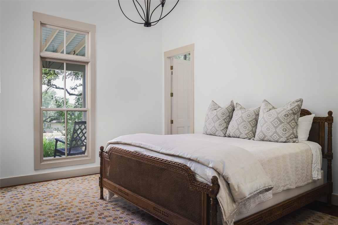 3020 Maravillas Loop Austin, TX 78735 - Photo 20 of 35 a bedroom with a bed and a window