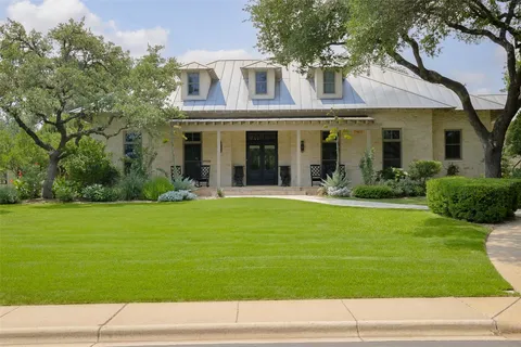 a view of a house with a swimming pool