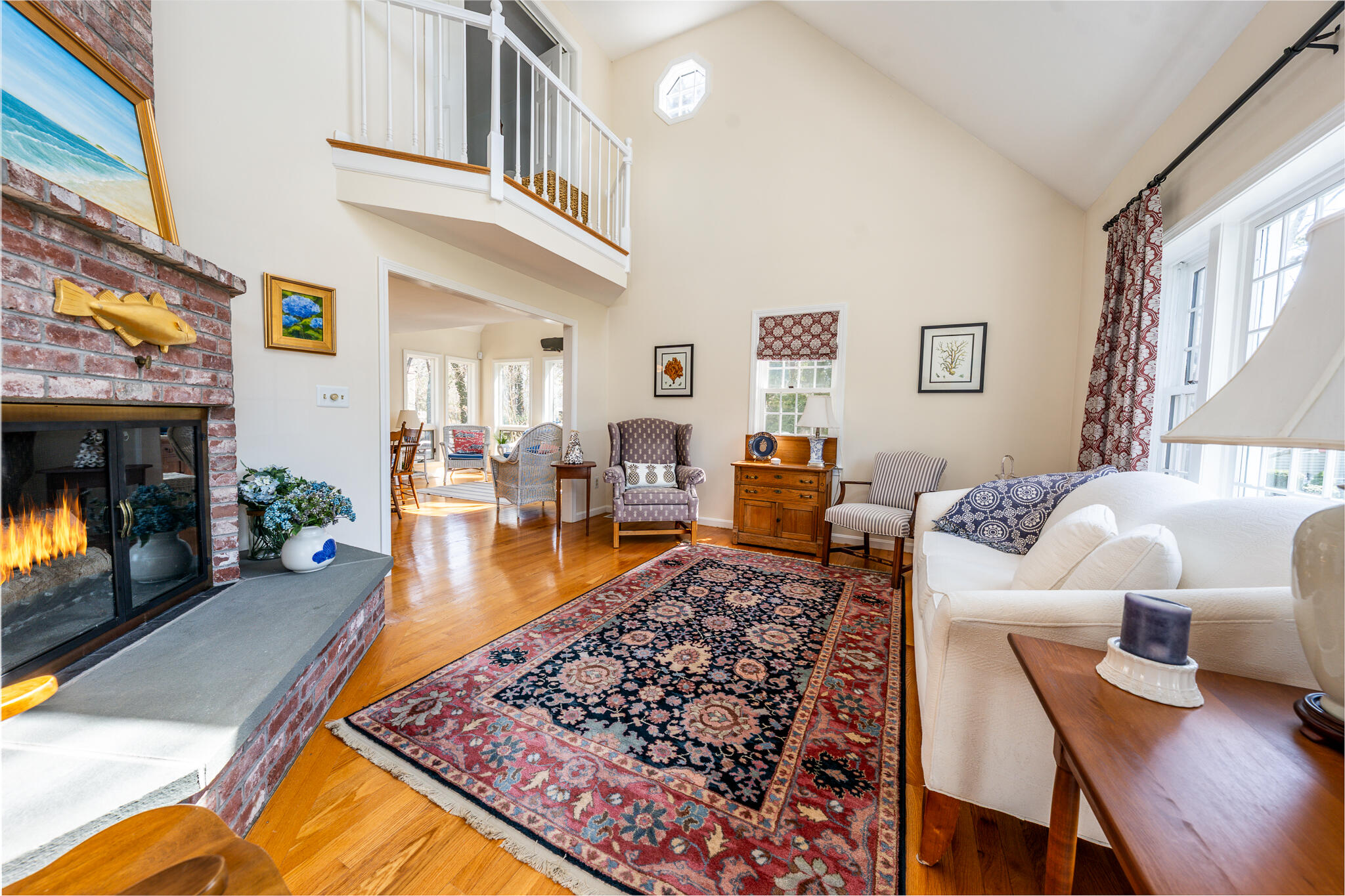 42 Eventide Lane Hyannis, MA 02601 - Photo 10 of 39 a living room with furniture and a fireplace