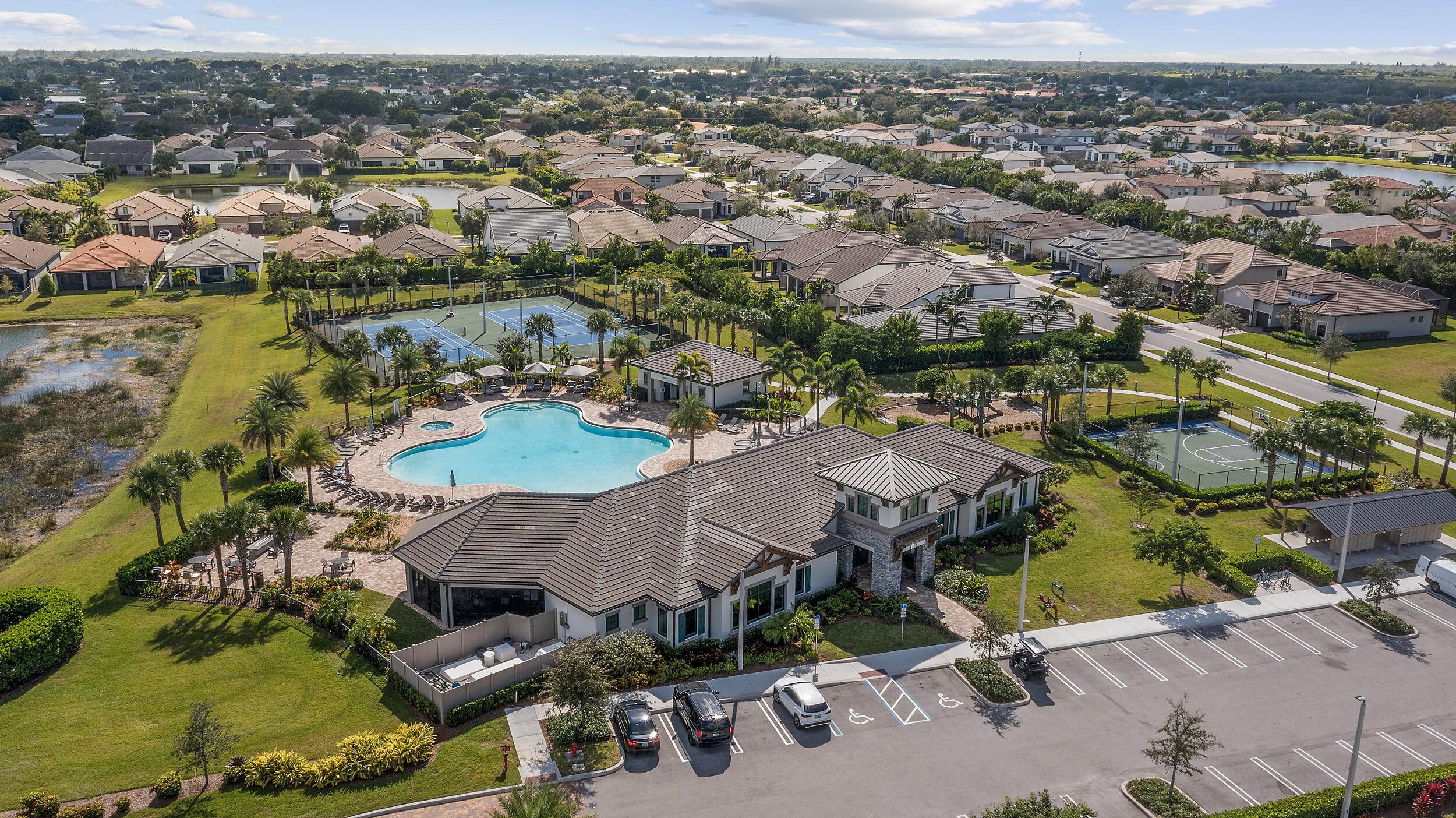 4762 Roldan Court Lake Worth, FL 33467 - Photo 38 of 41 an aerial view of residential houses with outdoor space