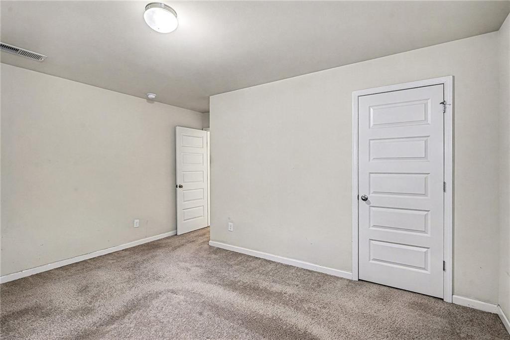 11046 Genova Terrace Hampton, GA 30228 - Photo 27 of 38 a view of an empty room
