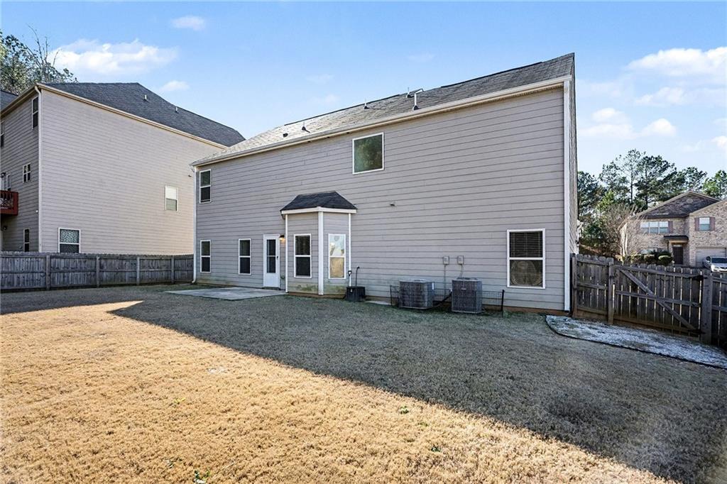 11046 Genova Terrace Hampton, GA 30228 - Photo 38 of 38 a view of backyard of house