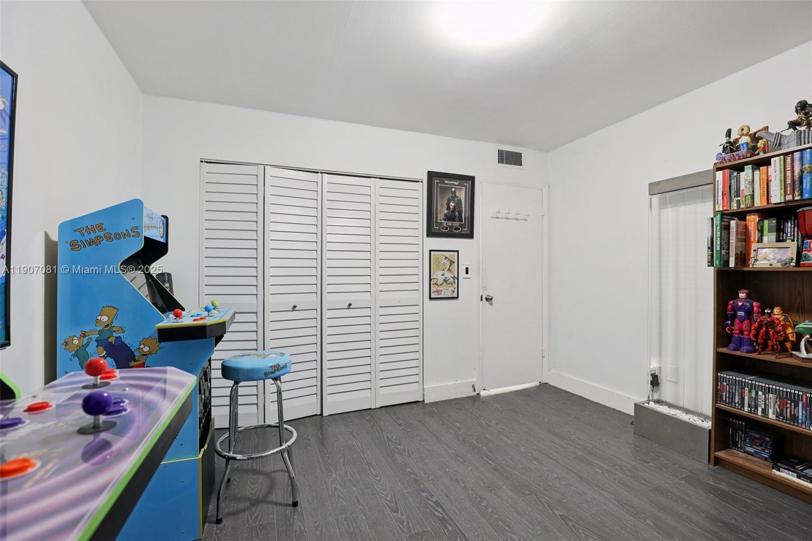 1630 West 46th Street, Unit 208F Hialeah, FL 33012 - Photo 12 of 21 a view of room with toys and wooden floor