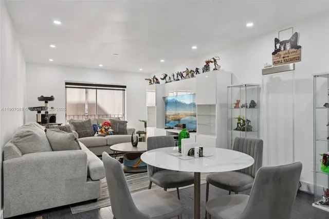 a living room with furniture and a table