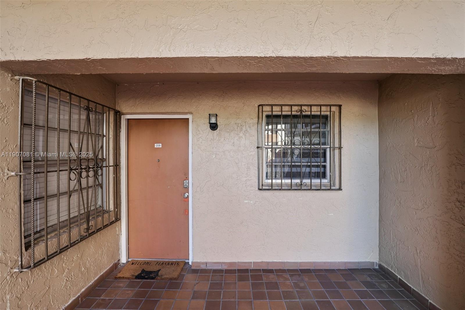 1630 West 46th Street, Unit 208F Hialeah, FL 33012 - Photo 20 of 21 a view of front door