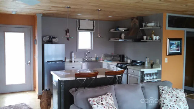 a view of a dining room with furniture