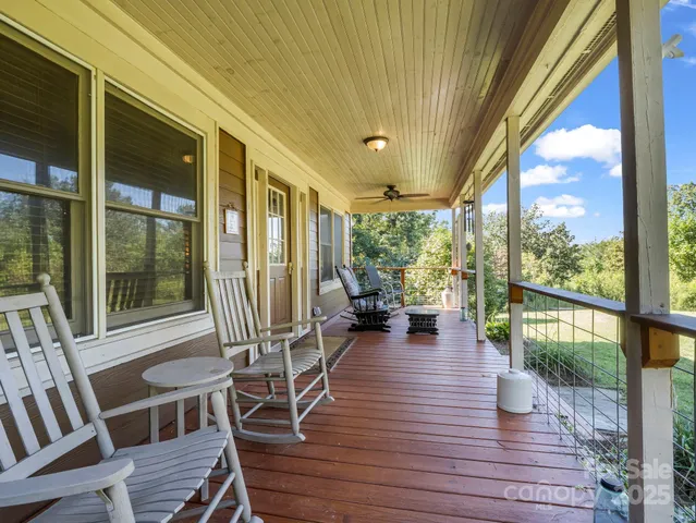 a view of a patio with wooden floor
