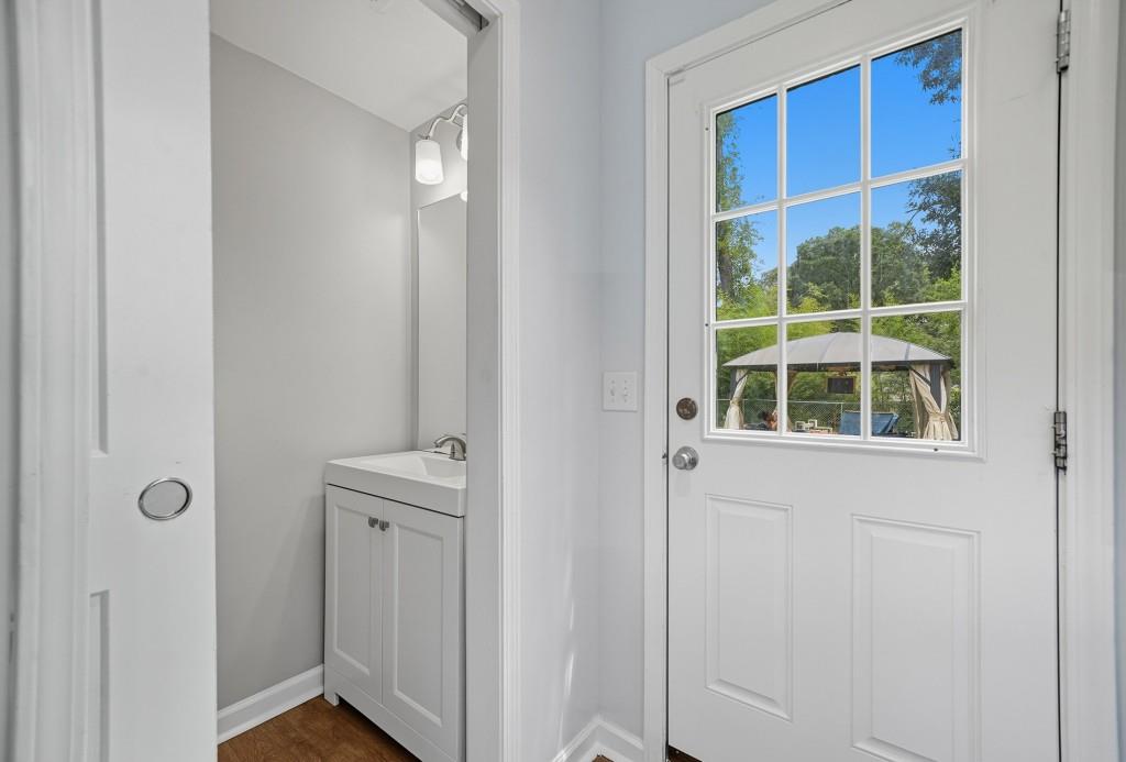 2490 Barge Road Southwest Atlanta, GA 30331 - Photo 11 of 27 a bathroom with a window and a sink