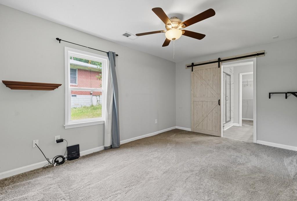 2490 Barge Road Southwest Atlanta, GA 30331 - Photo 13 of 27 a view of an empty room with a window