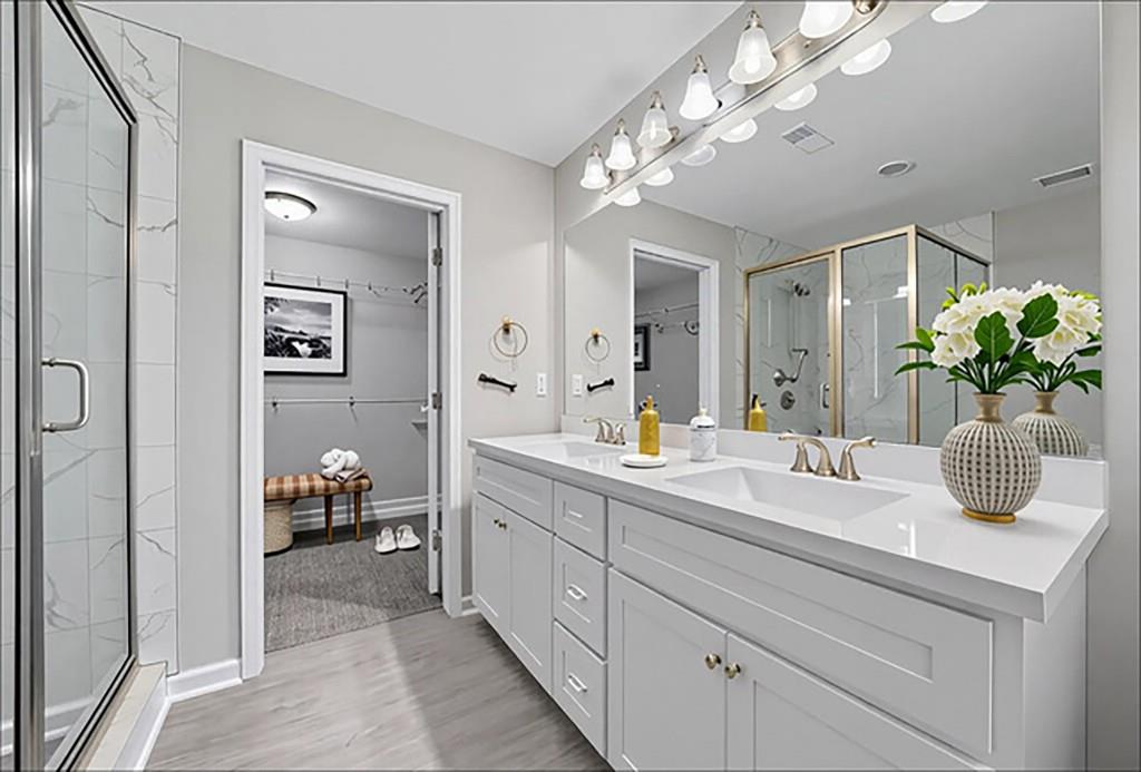 2490 Barge Road Southwest Atlanta, GA 30331 - Photo 15 of 27 a bathroom with a sink a potted plant and a mirror