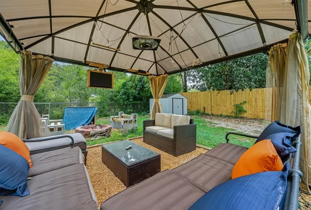 a view of yard with patio