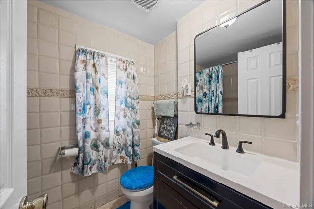 a bathroom with a sink and a toilet