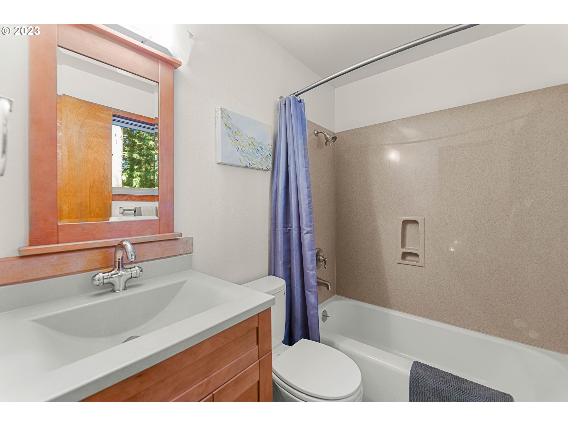 3111 Northwest 199th Street Ridgefield, WA 98642 - Photo 27 of 32 a bathroom with a sink and a mirror