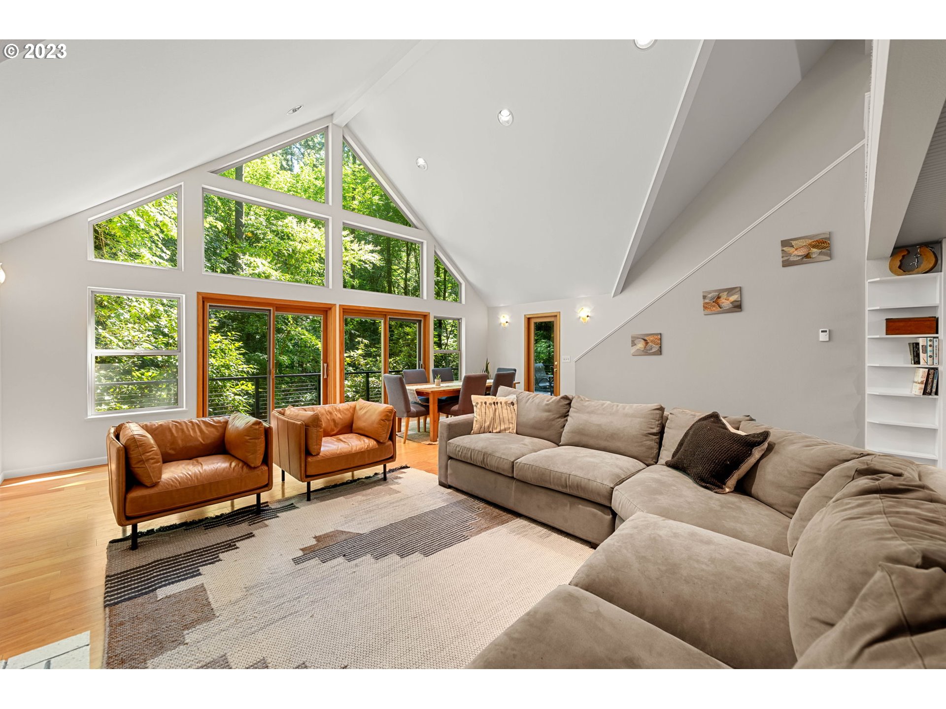 3111 Northwest 199th Street Ridgefield, WA 98642 - Photo 5 of 32 a living room with furniture and a large window