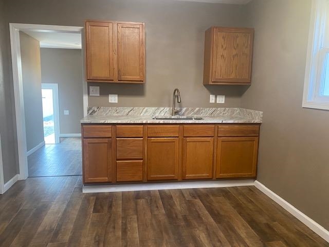509 West Erie Street Spring Valley, IL 61362 - Photo 8 of 19 a view of kitchen with granite countertop cabinets and sink