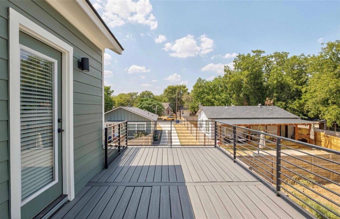 7407 Bethune Avenue, Unit 2 Austin, TX 78752 - Photo 17 of 30 a view of a balcony with wooden floor