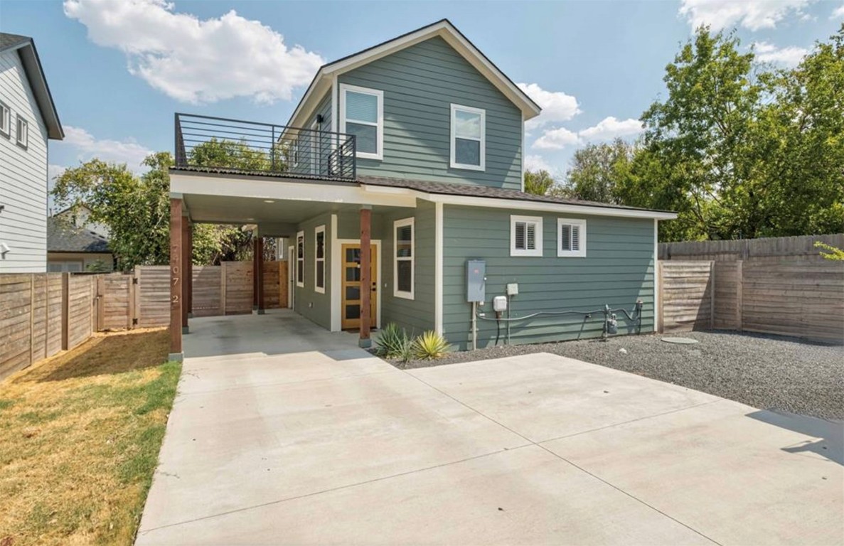7407 Bethune Avenue, Unit 2 Austin, TX 78752 - Photo 2 of 30 a view of house with backyard and glass windows