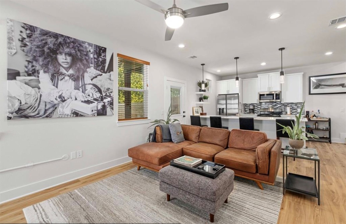 7407 Bethune Avenue, Unit 2 Austin, TX 78752 - Photo 7 of 30 a living room with furniture and kitchen view