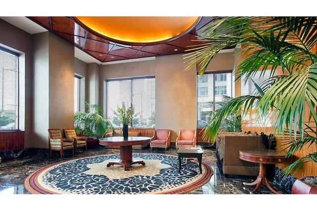 a view of a living room and a chandelier