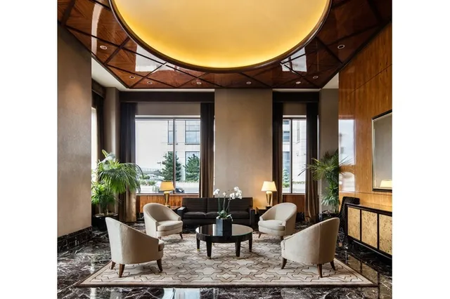 a view of a living room and entryway