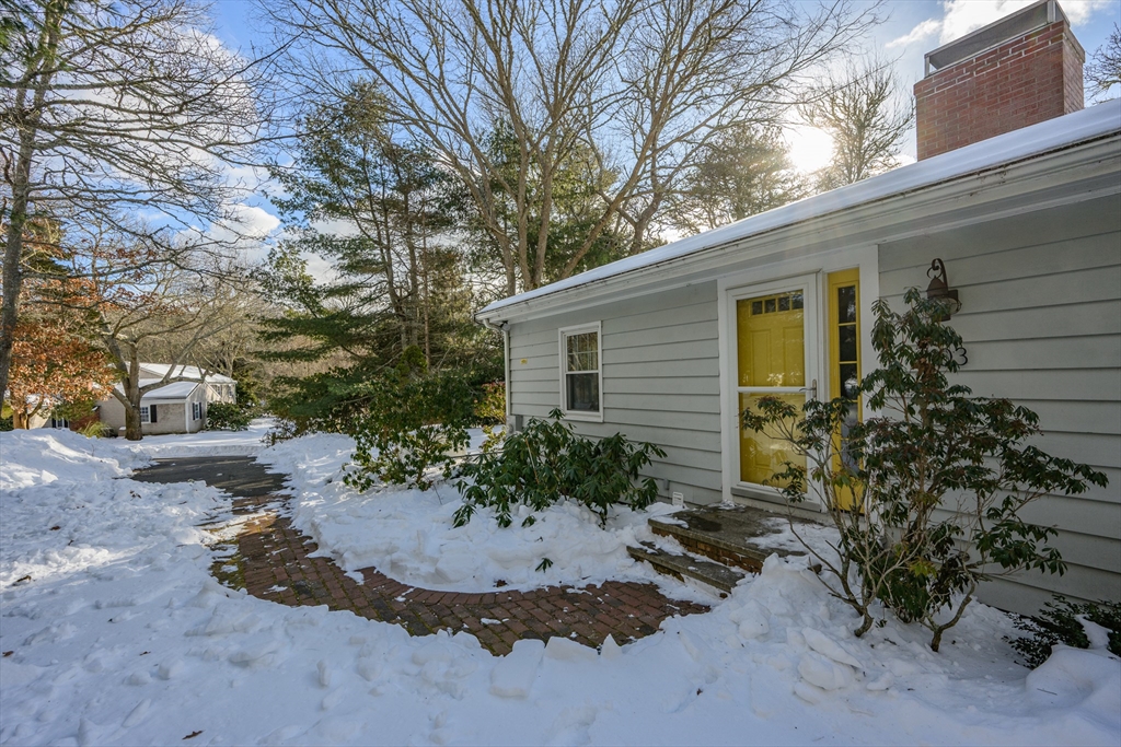 103 Pine Tree Drive Barnstable, MA 02632 - Photo 2 of 42 a view of a house with backyard and garden