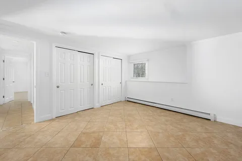 an empty room with an entryway