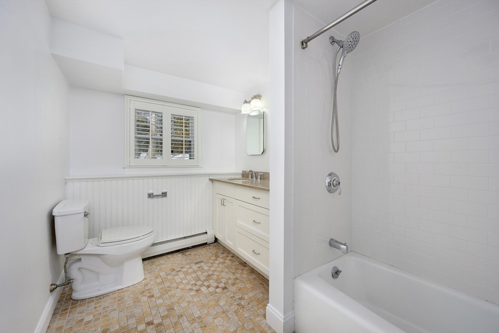 103 Pine Tree Drive Barnstable, MA 02632 - Photo 23 of 42 a bathroom with a sink toilet and shower