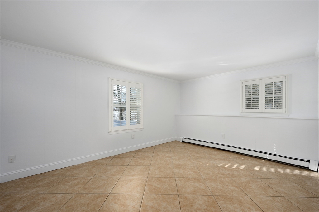 103 Pine Tree Drive Barnstable, MA 02632 - Photo 25 of 42 a view of an empty room with a window