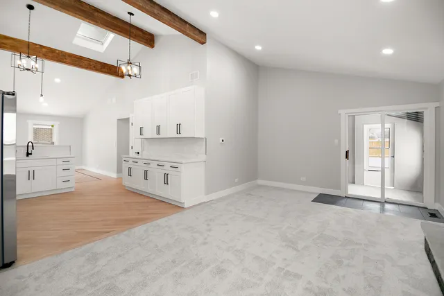 a view of a kitchen with a sink