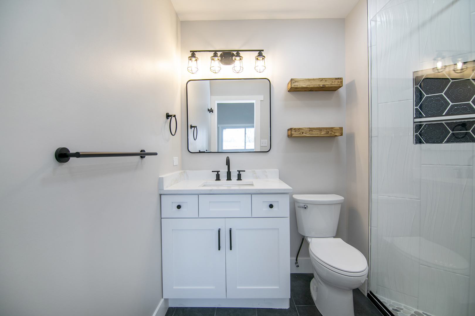 1623 East Street Lockport, IL 60441 - Photo 15 of 31 a bathroom with a toilet sink and mirror
