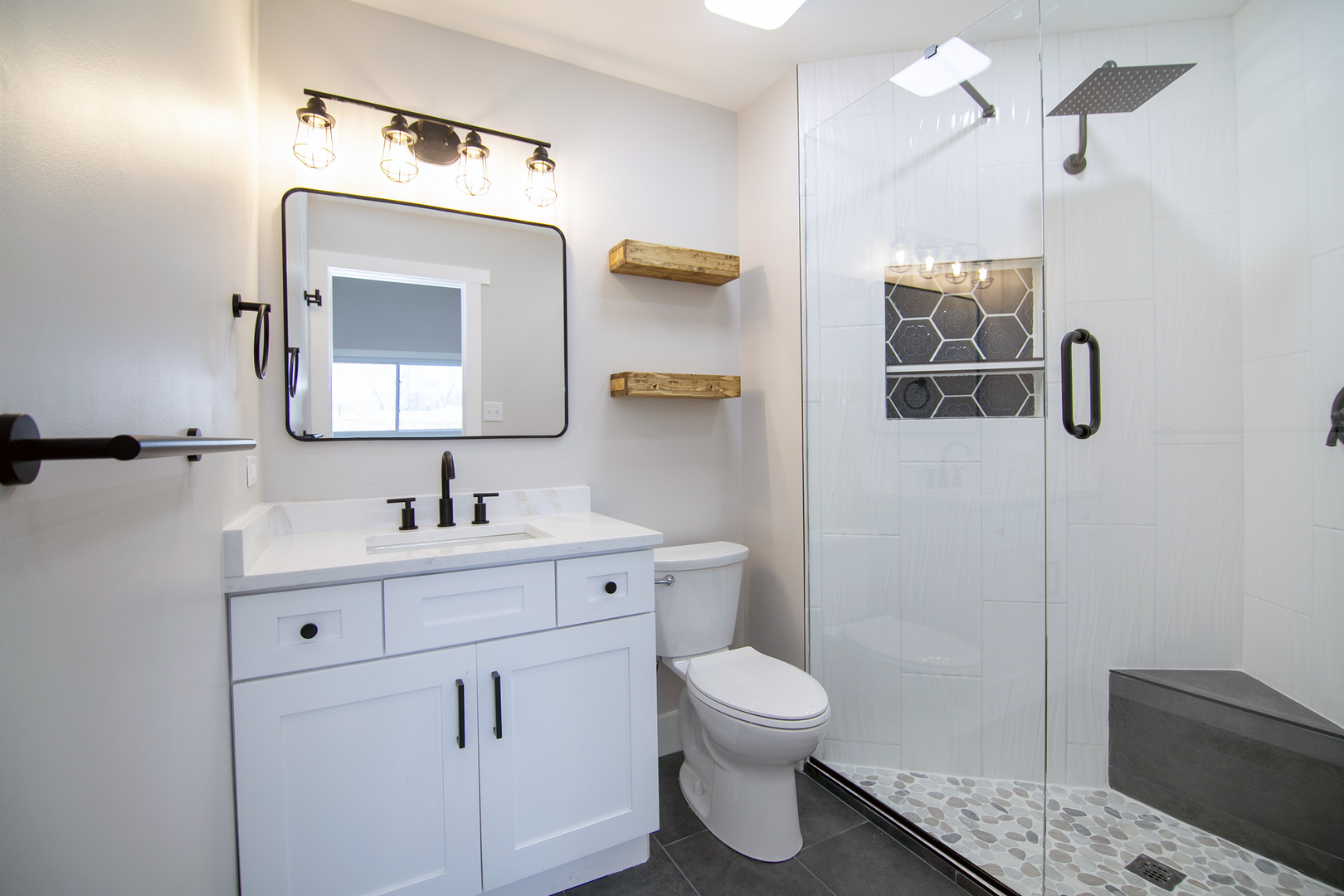 1623 East Street Lockport, IL 60441 - Photo 21 of 31 a bathroom with a toilet sink a mirror and vanity