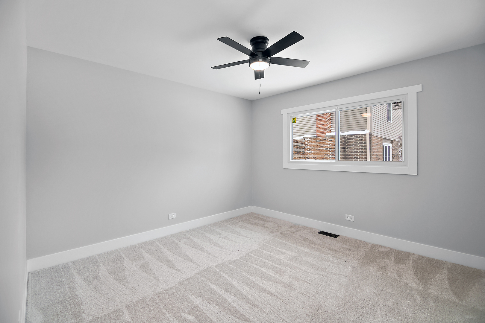 1623 East Street Lockport, IL 60441 - Photo 26 of 31 a view of a big room with wooden floor and windows