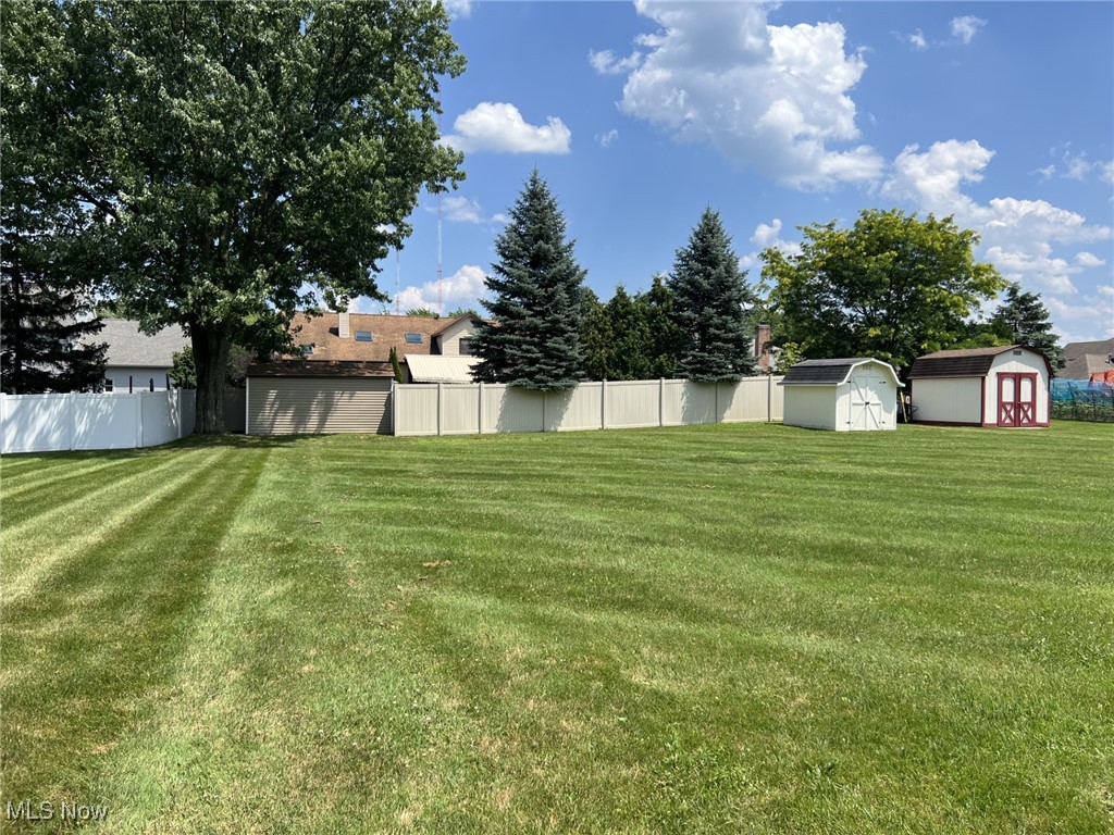 7579 McCreary Road Independence, OH 44131 - Photo 30 of 33 View of yard with a storage shed