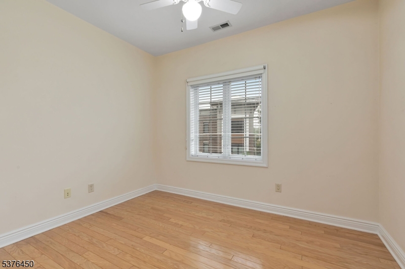 453 Springfield Avenue Berkeley Heights, NJ 07922 - Photo 19 of 34 an empty room with a window