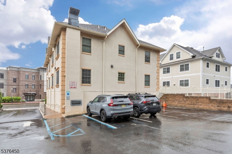 453 Springfield Avenue Berkeley Heights, NJ 07922 - Photo 33 of 34 a couple of cars parked in front of a building