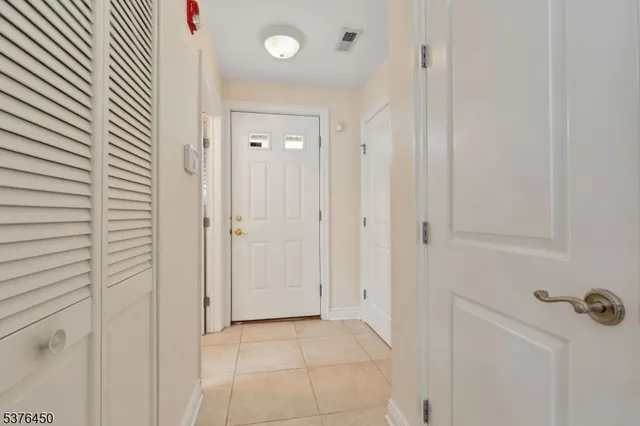 an empty room with a shower