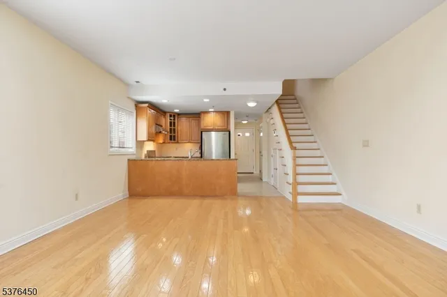 a view of a kitchen with a sink and dishwasher