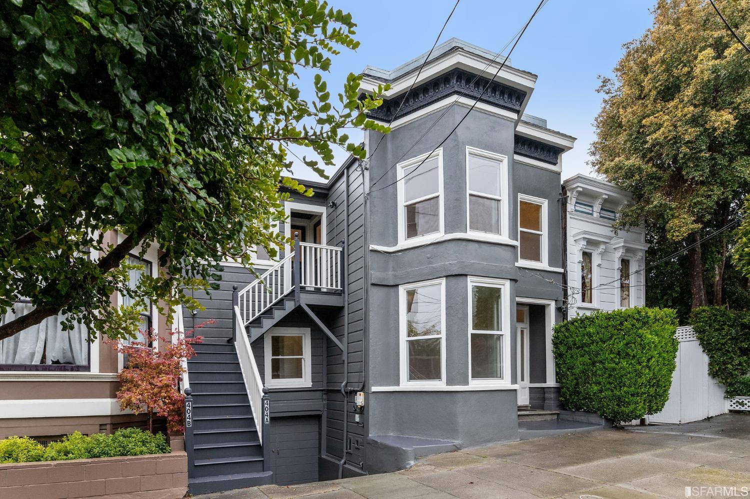 404 Vicksburg Street San Francisco, CA 94114 - Photo 1 of 72 a front view of a house with a garden