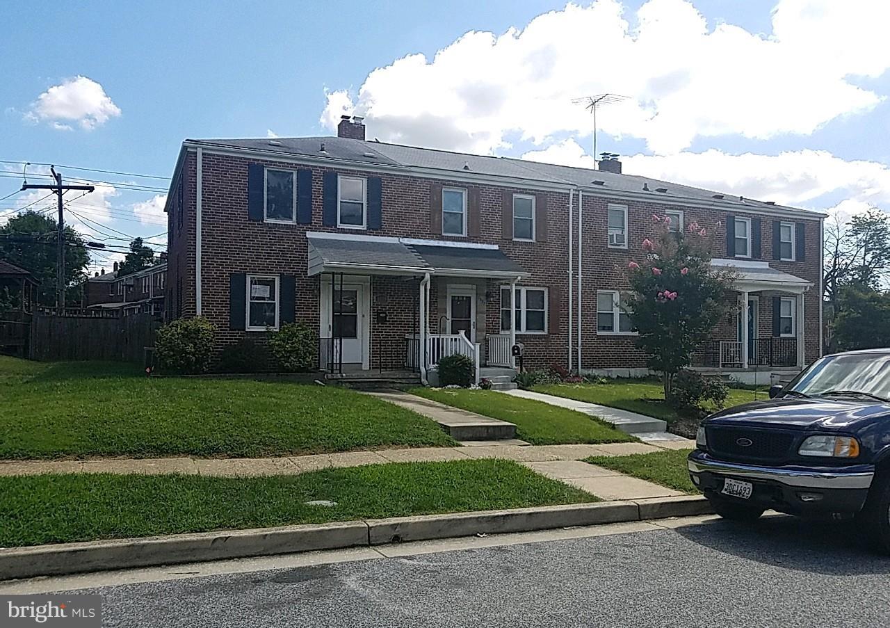 8539 Willow Oak Road Baltimore, MD 21234 - Photo 1 of 30 a car parked in front of a brick house
