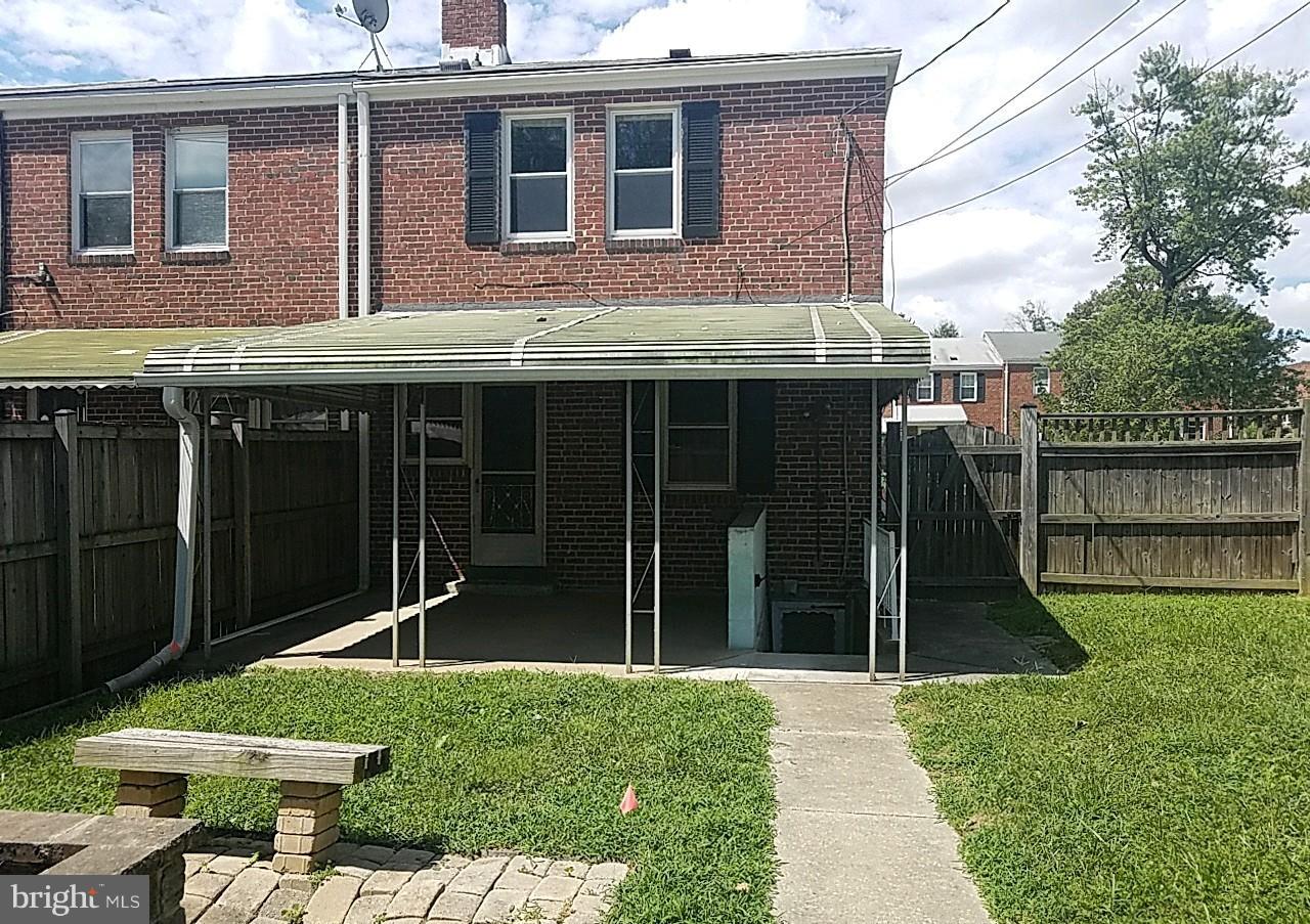 8539 Willow Oak Road Baltimore, MD 21234 - Photo 11 of 30 a view of a house with a yard and sitting area