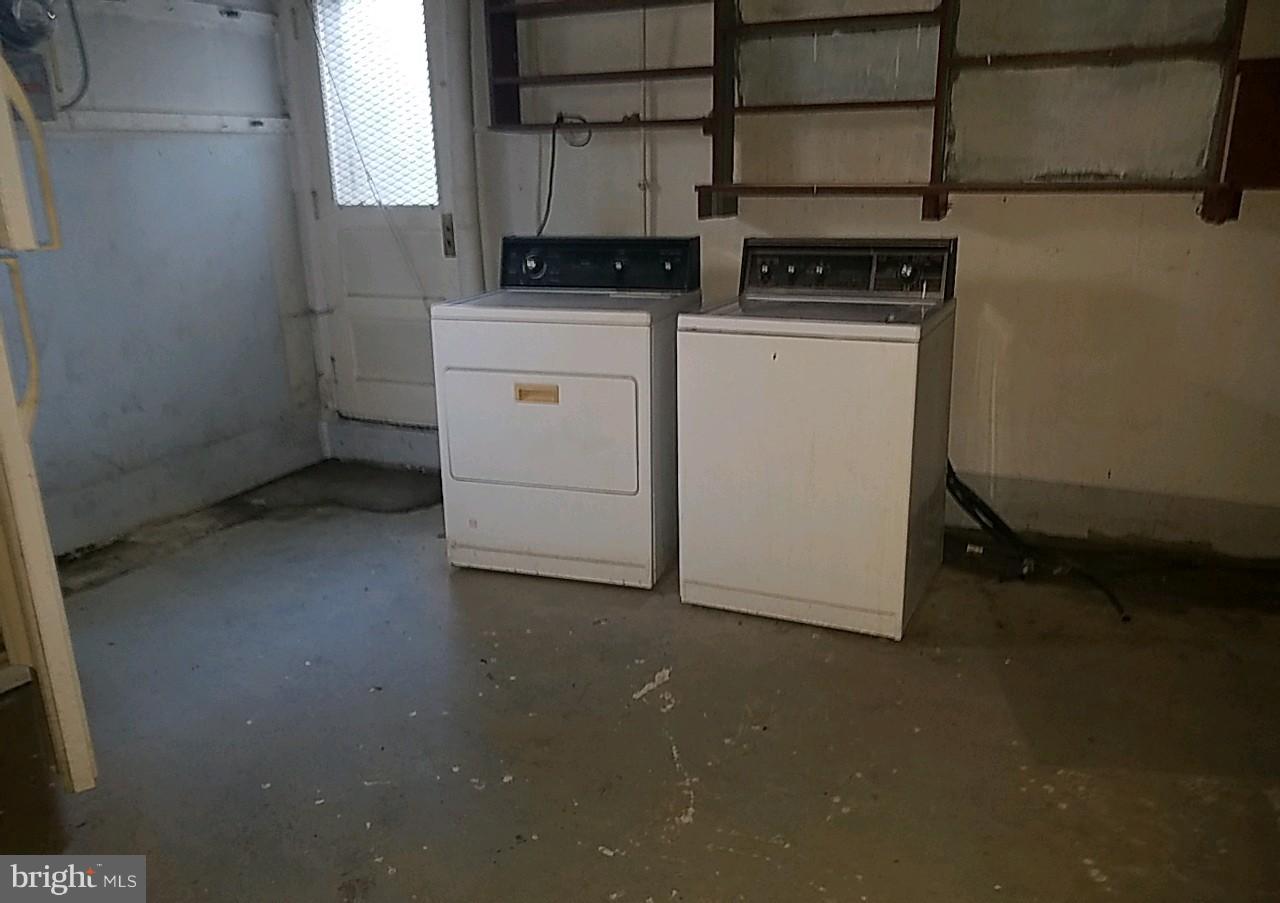8539 Willow Oak Road Baltimore, MD 21234 - Photo 15 of 30 a utility room with dryer and washer