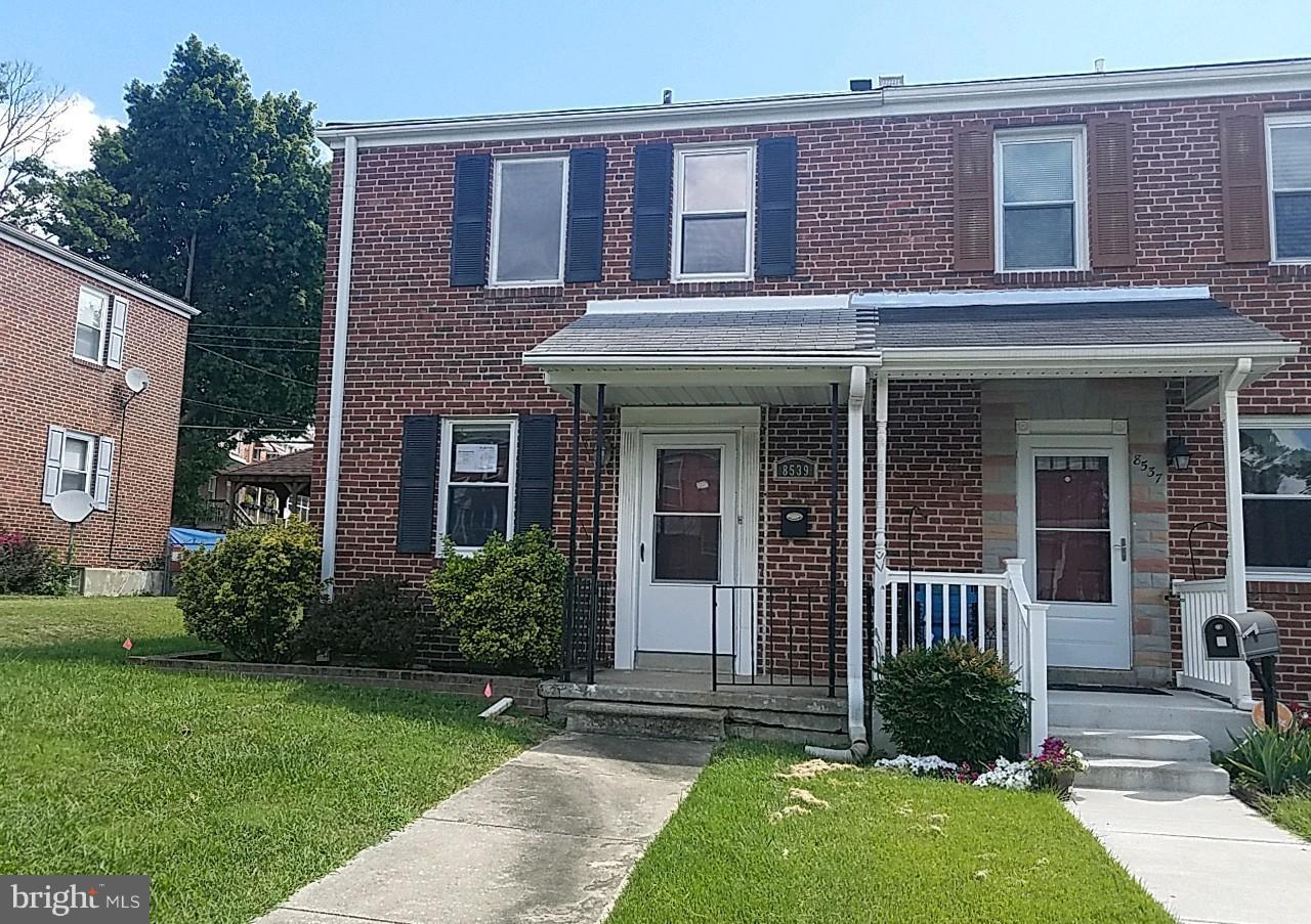 8539 Willow Oak Road Baltimore, MD 21234 - Photo 3 of 30 front view of a brick house with a yard