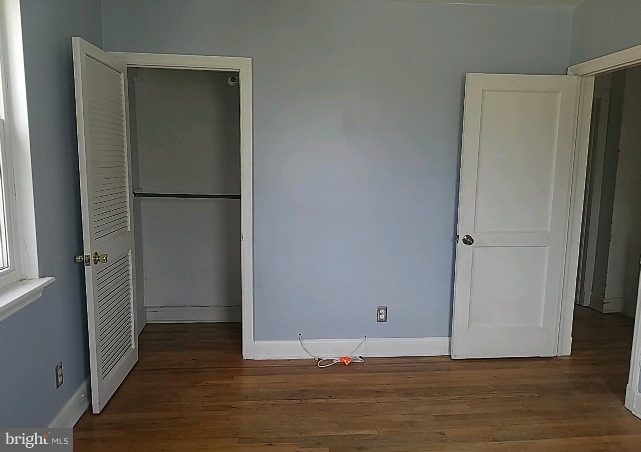 8539 Willow Oak Road Baltimore, MD 21234 - Photo 29 of 30 a view of empty room with wooden floor
